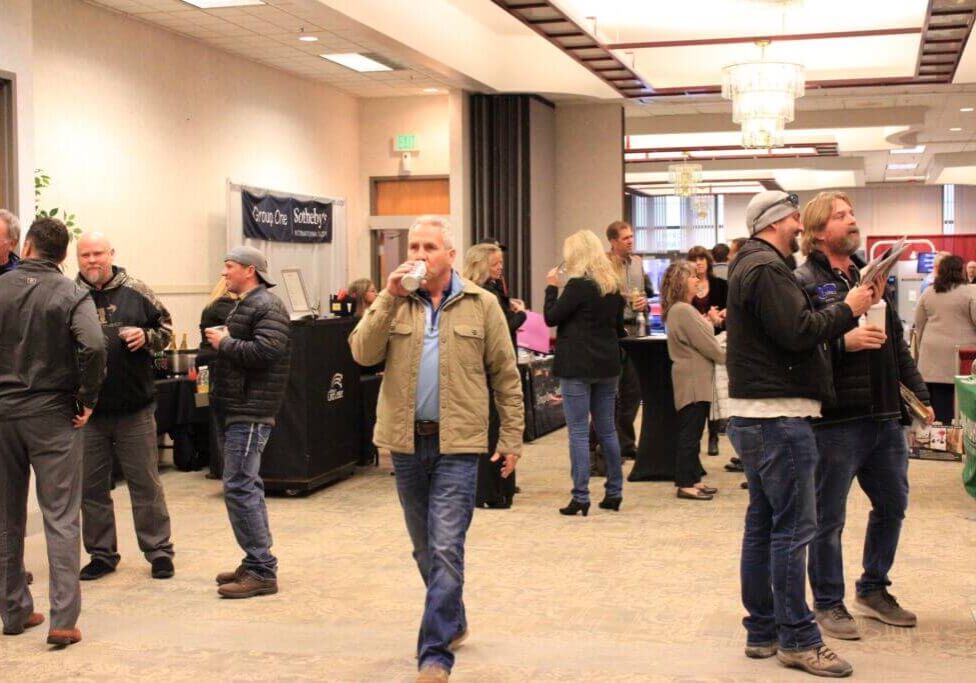 Builders Expo event hallway with groups of people